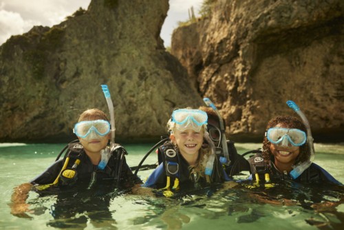 Young people on their open water scuba dive with SSI.