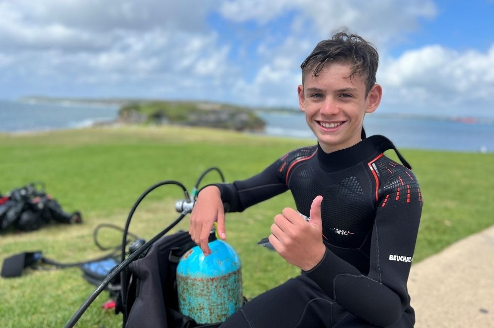 Young divers having fun on their open water scuba dive for certification.