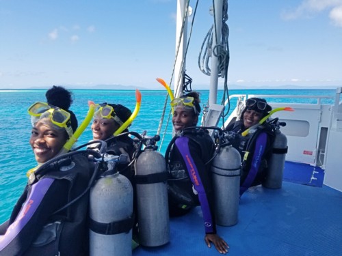 Padi divers get ready to begin their open water dive certification.